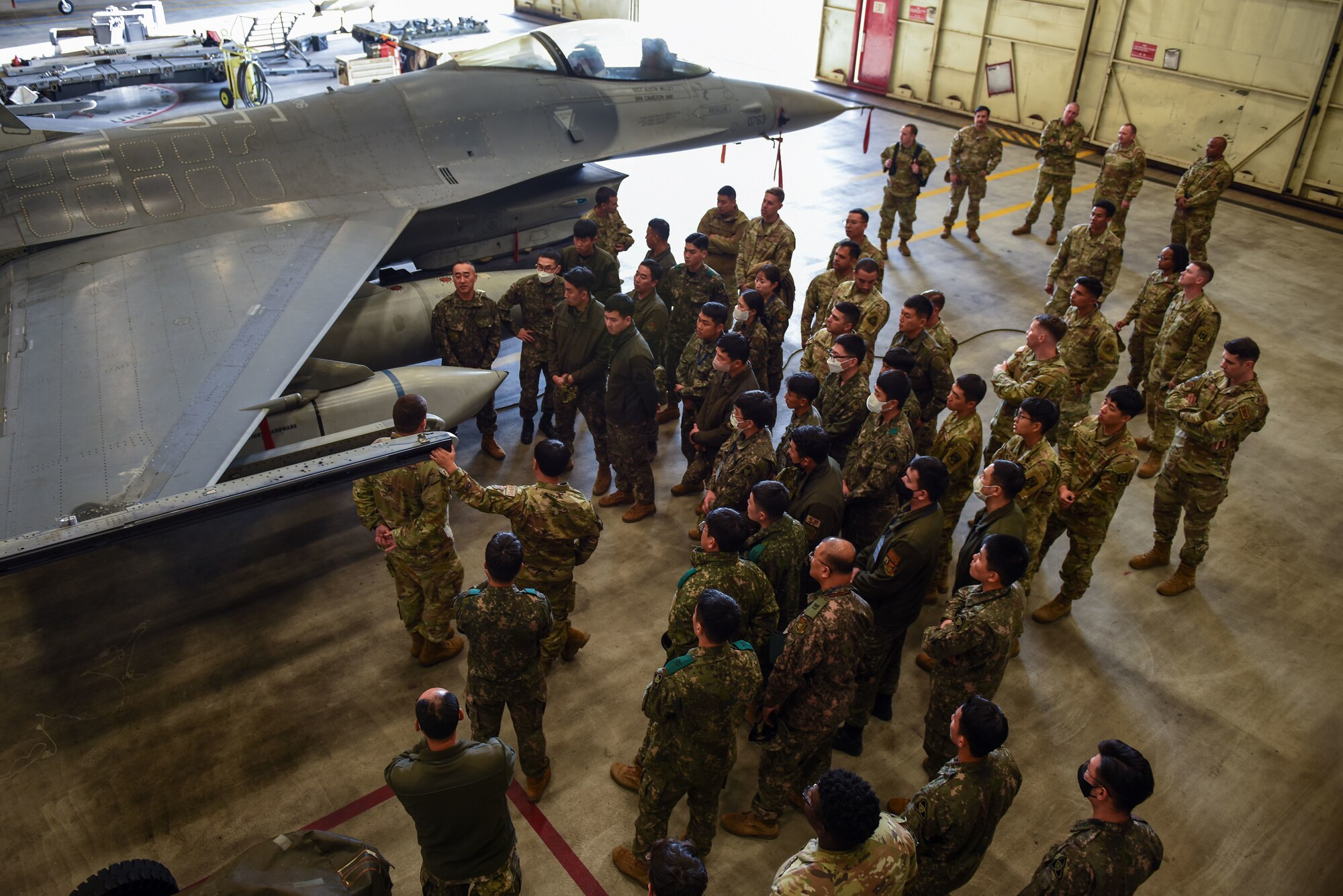 Members from the 8th Maintenance Group brief the Republic of Korea Army 35th Infantry Division and U.S. Army Soldiers during an immersion tour at Kunsan Air Base, Republic of Korea, Nov. 8, 2022. During the tour, the 8th MXG was able to highlight Kunsan’s “Fight Tonight” capabilities and operations. (U.S. Air Force photo by Tech. Sgt. Timothy Dischinat)