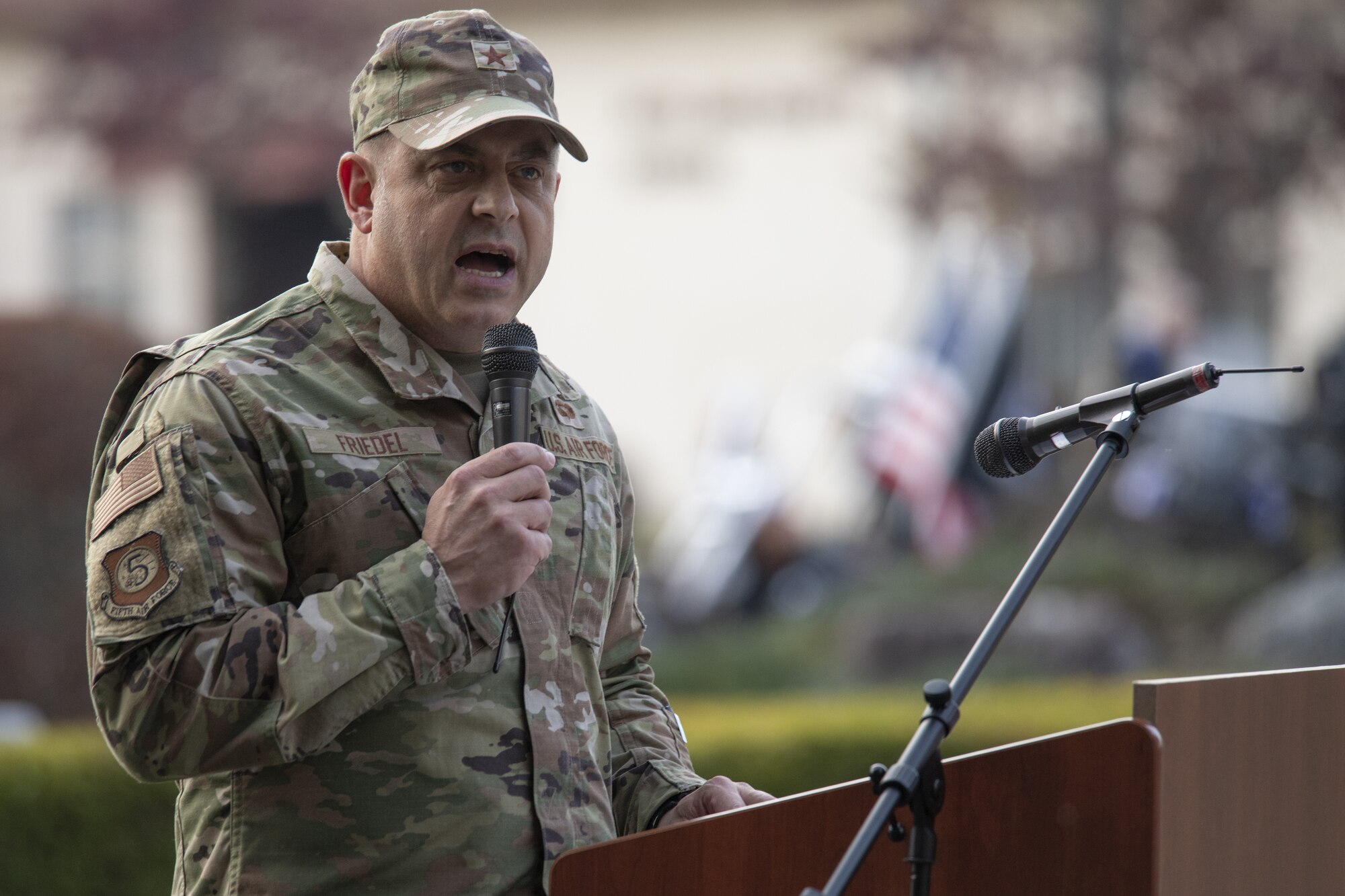 Brig. Gen. Jesse Friedel, Fifth Air Force deputy commander, delivers remarks during the 2022 Yokota Veterans Day Ceremony at Yokota Air Base, Japan, Nov. 10, 2022. Members of Yokota conducted a Retreat Ceremony as part of the event to respect and recognize the contributions veterans and their families have made toward the cause of freedom and peace across the globe. (U.S. Air Force photo by Tech. Sgt. Christopher Hubenthal)