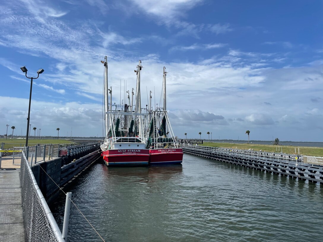A fleet of fishing trawlers and other vessels locked through the Canaveral Lock to find safe harbor before the arrival of Tropical Storm Nicole. Canaveral lock operators locked through an amazing 222 vessels during 59 lockages in two days.