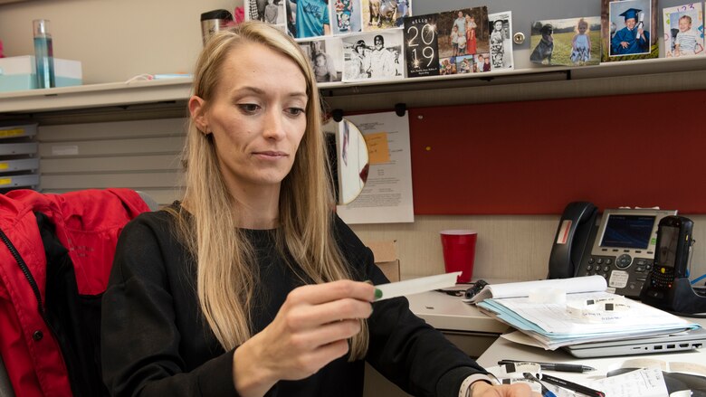 Pamela King, Logistics Management Office general supply specialist, is the U.S. Army Corps of Engineers Nashville District Employee of the Month for August 2022. She is seen here scanning old cell phones for turn in Nov. 8, 2022, at the district headquarters in Nashville, Tennessee. (USACE Photo by Lee Roberts)