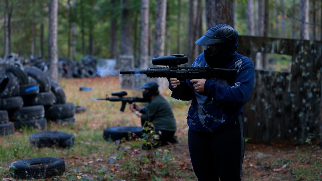 Volunteers engage with participants using paintball guns at Devil Dog Dare, Marine Corps Air Station (MCAS) Cherry Point, during the 25th Annual All-Terrain Unit Competition, MCAS Cherry Point, North Carolina, Oct. 28, 2022. Participants completed five physically demanding challenges over a seven-mile course. The competition allowed various units to build comradery while boosting morale. (U.S. Marine Corps photo by Cpl. Symira Bostic)