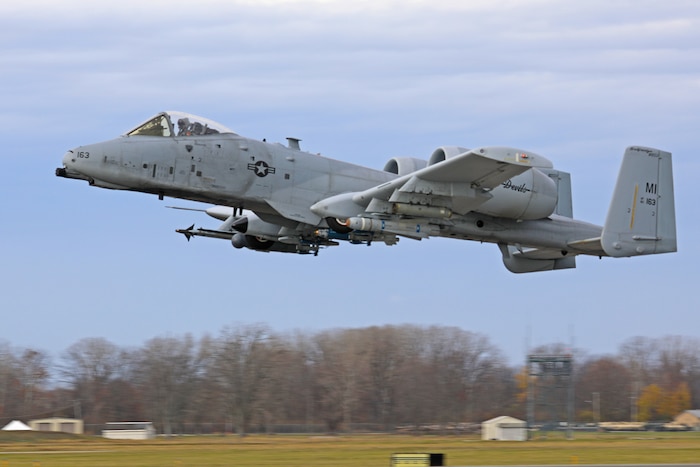 A-10 flies in air near ground