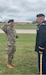 Lt. Col. Jeremi Ruby with Spc. Gabriele Ruby, giving Spc. Ruby, her first battalion coin after completing basic training at Fort Leonard Wood, Missouri, on Aug. 21, 2021. (Photo by Lt. Col. Shannon Ruby)