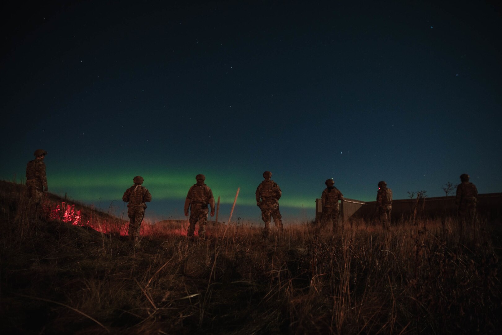 Members of the 137th Mission Sustainment Team conduct an unexploded ordnance sweep during U.S. Special Operations Command Europe led ATREUS 22-4 at Andøya Space Defense Range, Norway, Nov. 8, 2022. This was the first time the multi-capable Airmen conducted their mission in a setting realistic to the austere environments they will encounter while supporting global SOF operations. (U.S. Air National Guard photo by Tech. Sgt. Brigette Waltermire)
