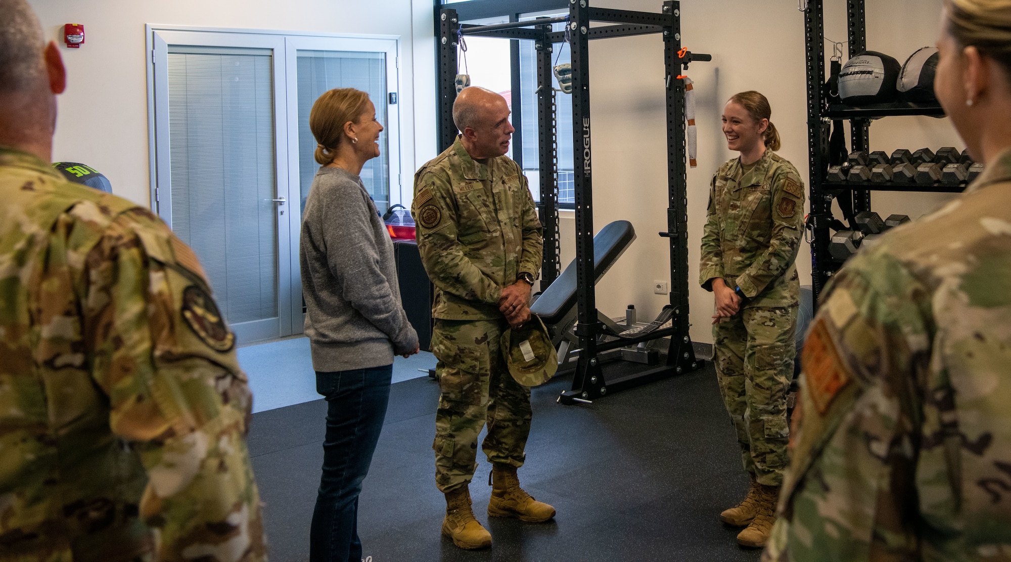 U.S. Air Force Lt. Gen. Robert Miller, Surgeon General of the Air Force, and Chief Master Sgt. Dawn Kolczynski, Medical Enlisted Force and Enlisted Corps Chief, visit the Cobra Clinic at Aviano Air Base, Italy, Nov. 9, 2022. The Cobra Clinic uses a comprehensive approach to health, both physical and mental, with a focus on musculoskeletal conditions and physical therapy. (U.S. Air Force photo by Airman 1st Class Thomas Calopedis)