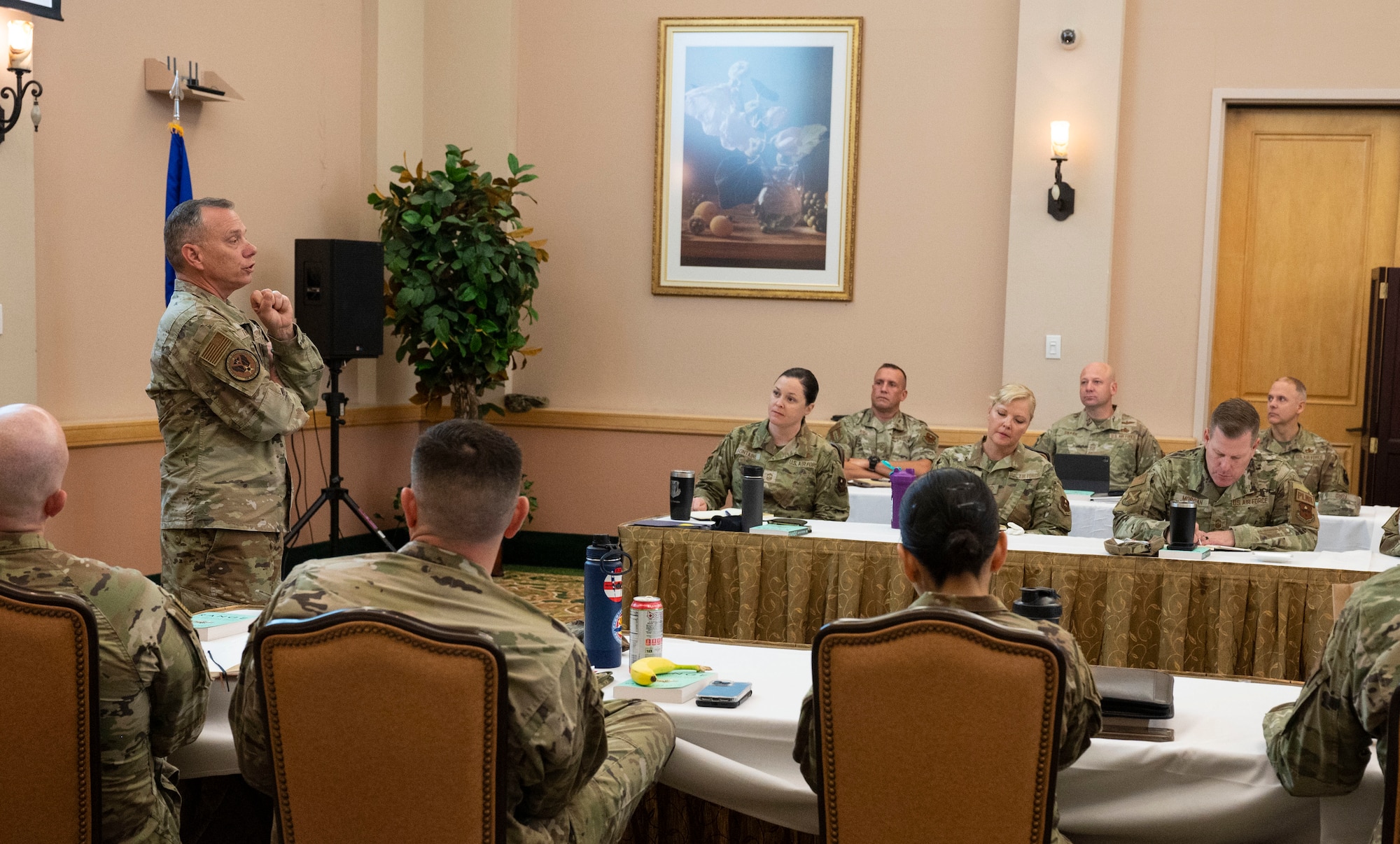 U.S. Air Force Chief Master Sgt. Erik Thompson, command chief of Air Education and Training Command, gives a briefing to command chiefs during AETC's Gathering of the Torch at Joint Base San Antonio-Lackland, Texas, Nov. 7, 2022