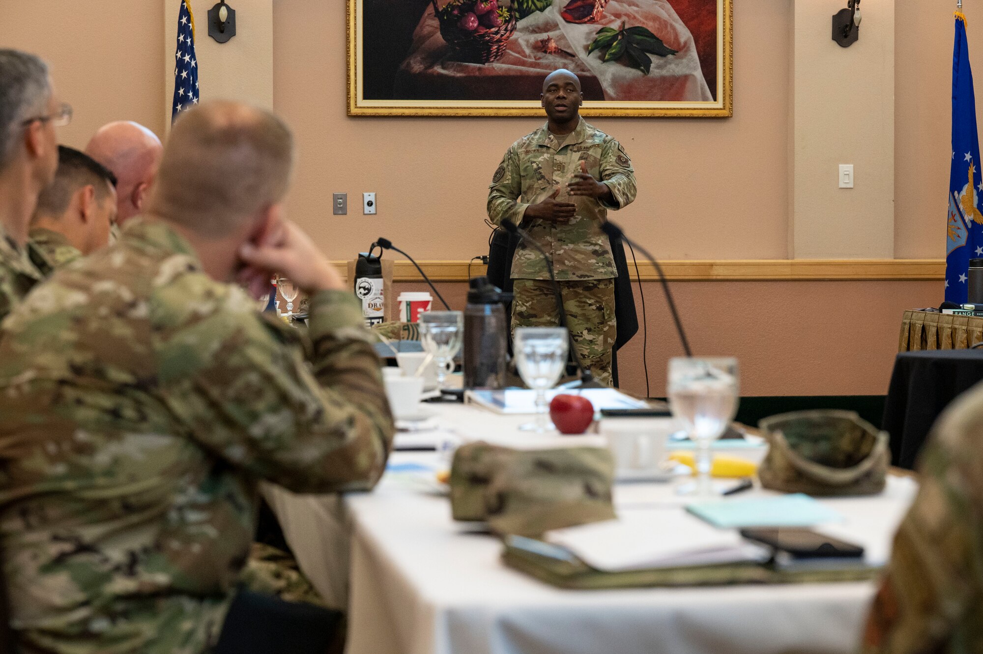 U.S. Air Force Senior Master Sgt. Jahara Brown, Headquarters Air Force, gives a briefing to command chiefs during AETC's Gathering of the Torch at Joint Base San Antonio-Lackland, Texas, Nov. 7, 2022