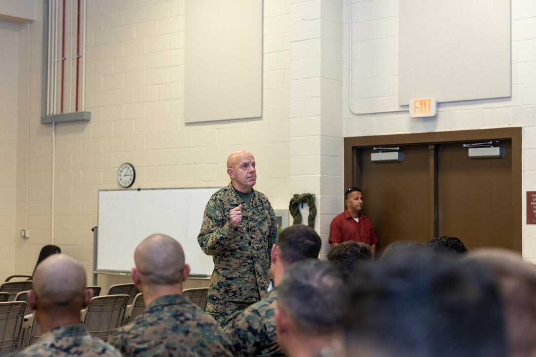 U.S. Marine Corps Gen. David H. Berger, 38th Commandant of the Marine Corps, speaks to Marines and Sailors during a townhall