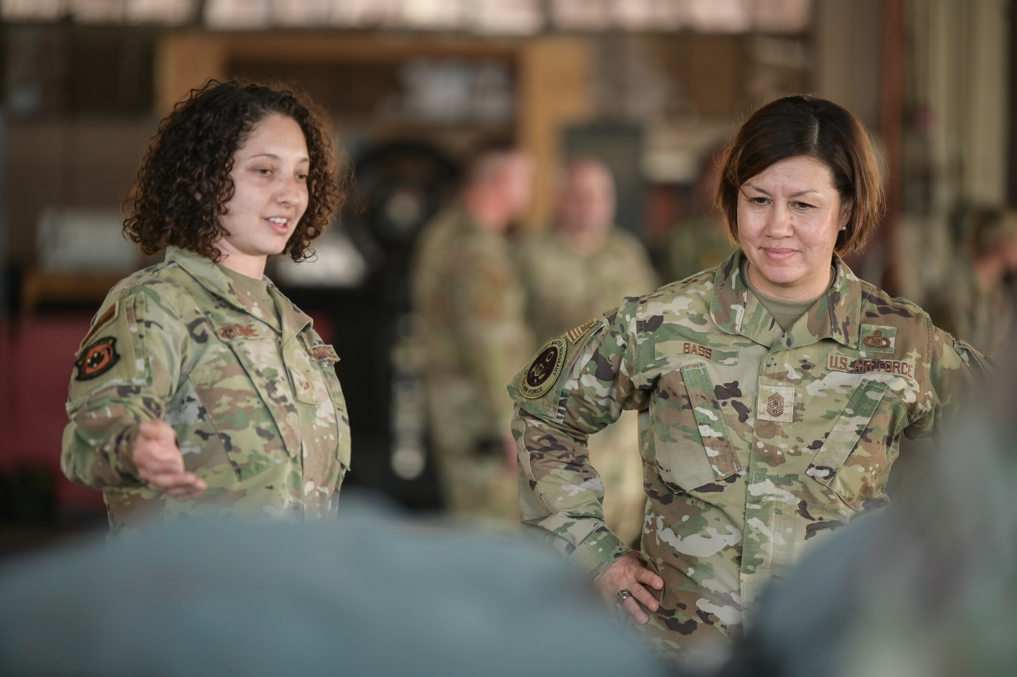 Senior Airman Stephanie Hawthorne, 647th Logistics Readiness Squadron combat mobility flight team member, briefs Chief Master Sgt. of the Air Force JoAnne S. Bass about cargo operations during a base visit at JBPH-H, Hawaii, Nov. 7, 2022. Bass’ visit focused on familiarization of the 647th Air Base Group’s mission and the support they provide to U.S. Navy and U.S. Air Force personnel. (U.S. Air Force photo by Staff Sgt. Alan Ricker)