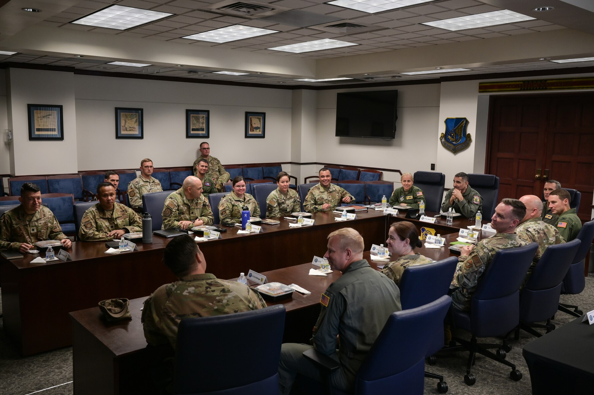 U.S. Air Force Lt. Gen. David Nahom, commander of Alaskan NORAD Region, Alaskan Command and 11th Air Force, greets Air Force squadron and group commanders during a 15th Wing immersion tour on Joint Base Pearl Harbor-Hickam, Hawaii, Oct. 24, 2022. The purpose of the two-day tour was to provide Nahom with insight to the 15th Wing’s mission and showcase the Airmen that make it possible. (U.S. Air Force photo by Staff Sgt. Alan Ricker)