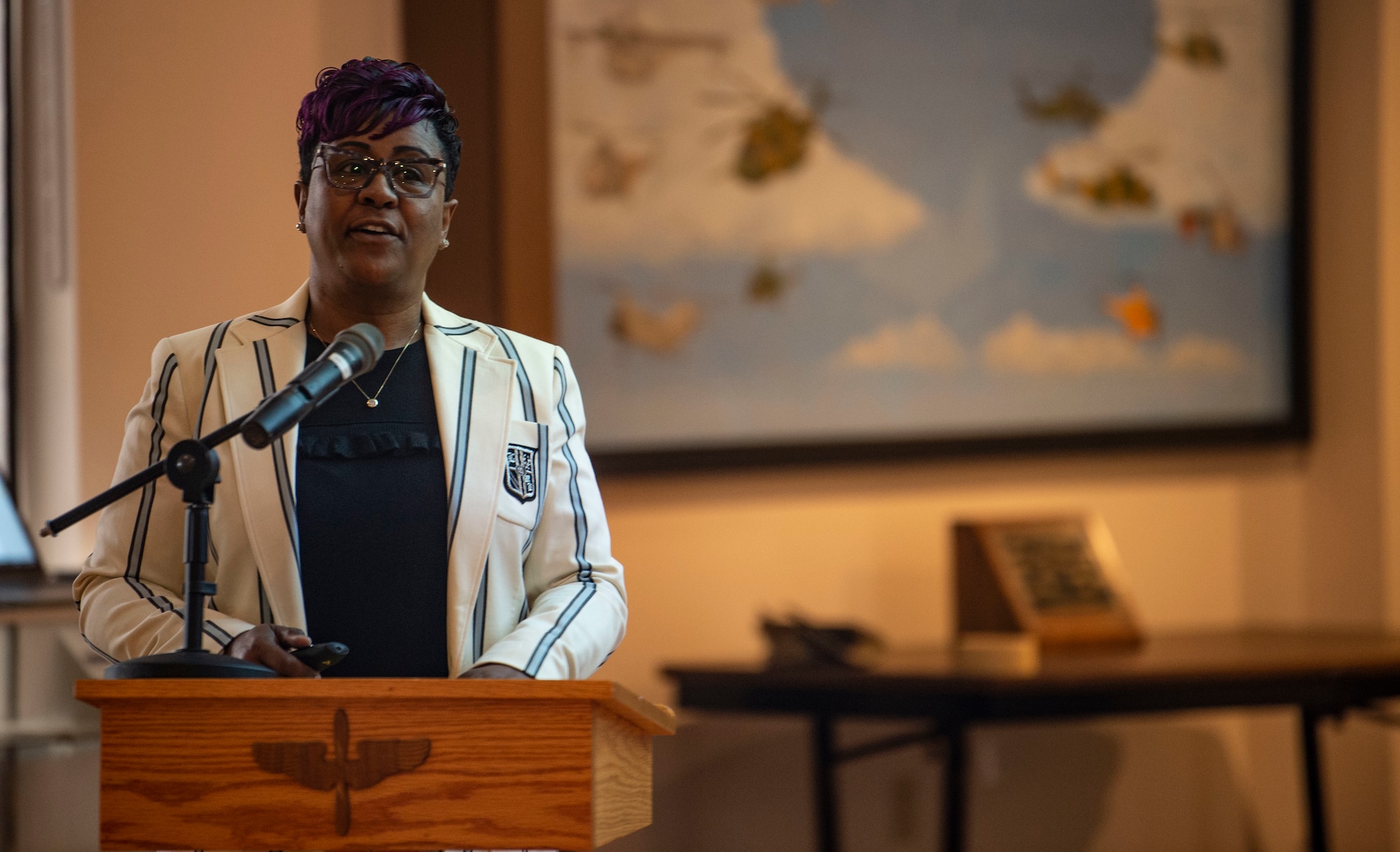 woman talking at a podium