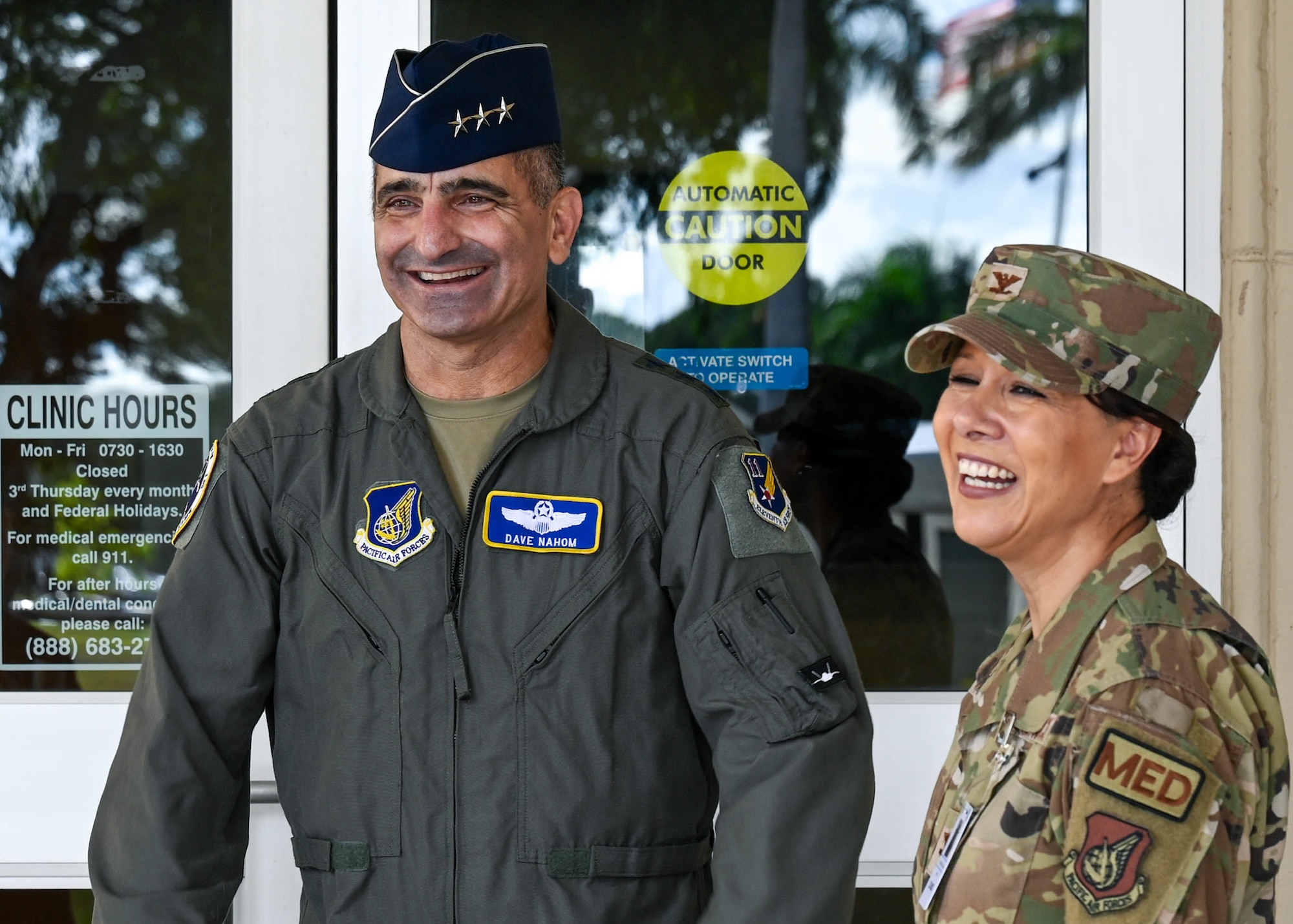 U.S. Air Force Lt. Gen. David Nahom, commander of Alaskan NORAD Region, Alaskan Command and 11th Air Force, smiles with U.S. Air Force Col. Stella Garcia, 15th Medical Group commander, during an immersion tour at Joint Base Pearl Harbor-Hickam, Hawaii, Oct. 28, 2022. Nahom learned details of 15th Medical Group’s history and the significance of numerous events and recognized the efforts of multiple 15th MDG Airmen. (U.S. Air Force photo by Senior Airman Zoie Cox)