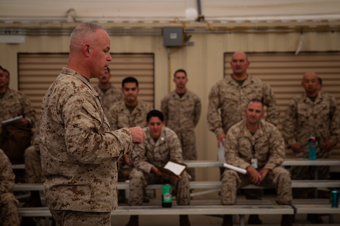 US Marine Colonel speaks with a group of Marines