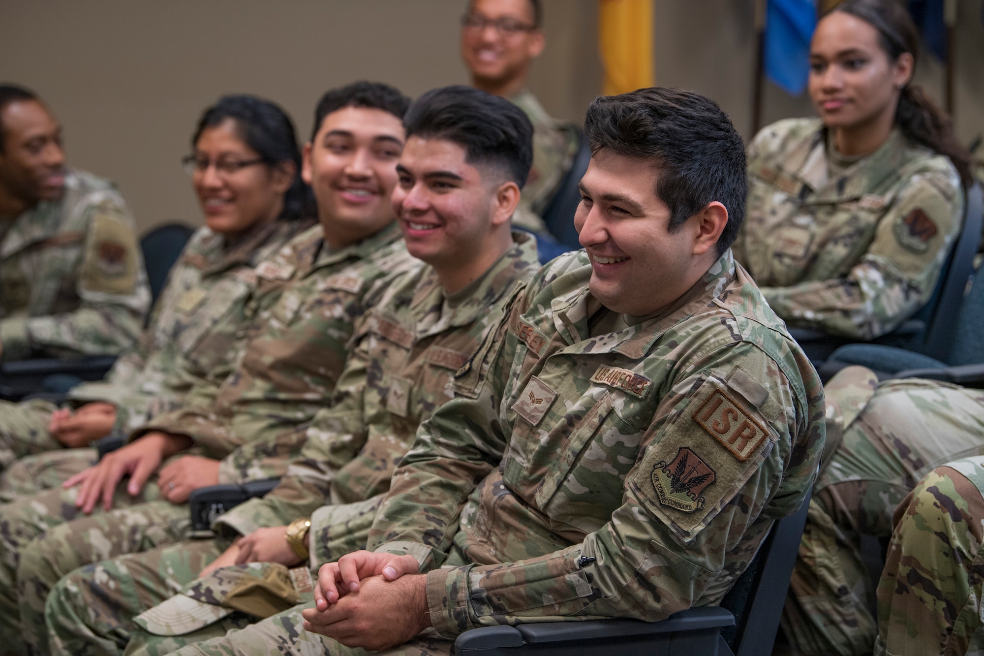 A photo of a group of Airmen laughing