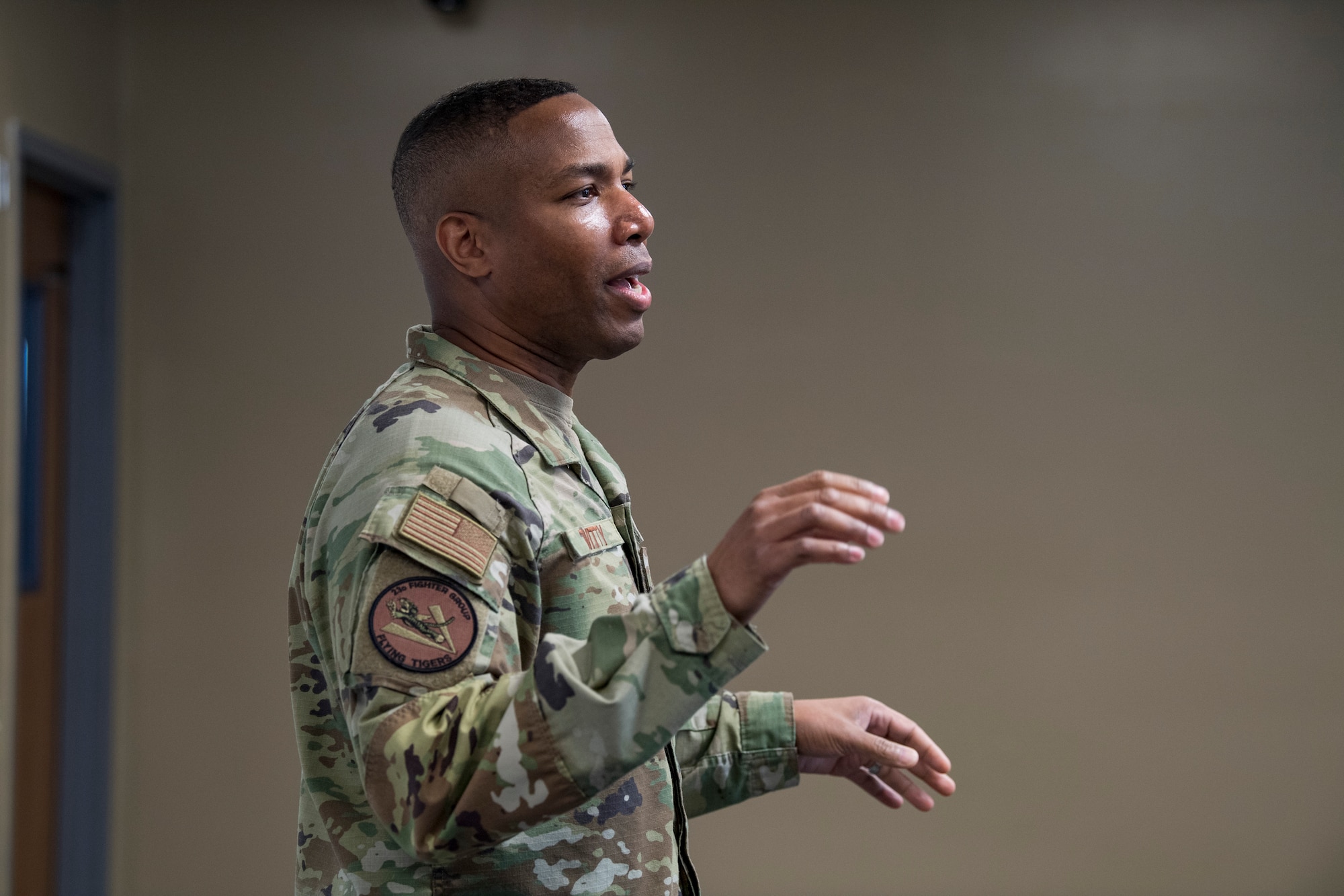 Photo of an Airman speaking