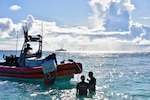 U.S. Coast Guard invests time with Oceania partners, initiates SANTA RITA, Guam Operation Rematau