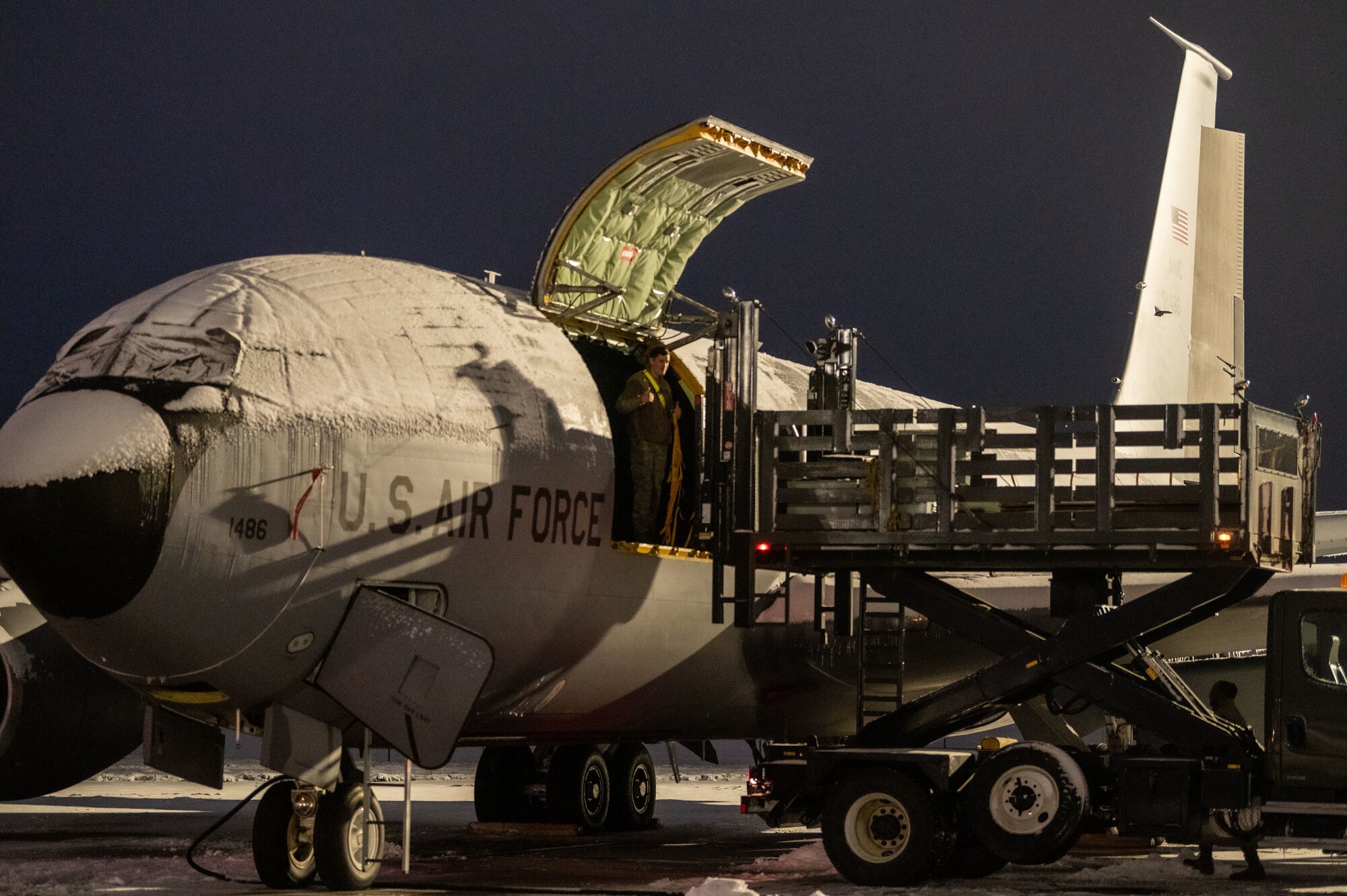 U.S. Air Force Airmen from the 92nd Air Refueling Wing load cargo onto a KC-135 Stratotanker during Titan Fury 23-1, at Fairchild Air Force Base, Washington, Nov. 7, 2022. The exercise demonstrated maintenance Airmen’s ability to generate aircraft and crews to rapidly respond and immediately mobilize. (U.S. Air Force photo by Airman 1st Class Stassney Davis)