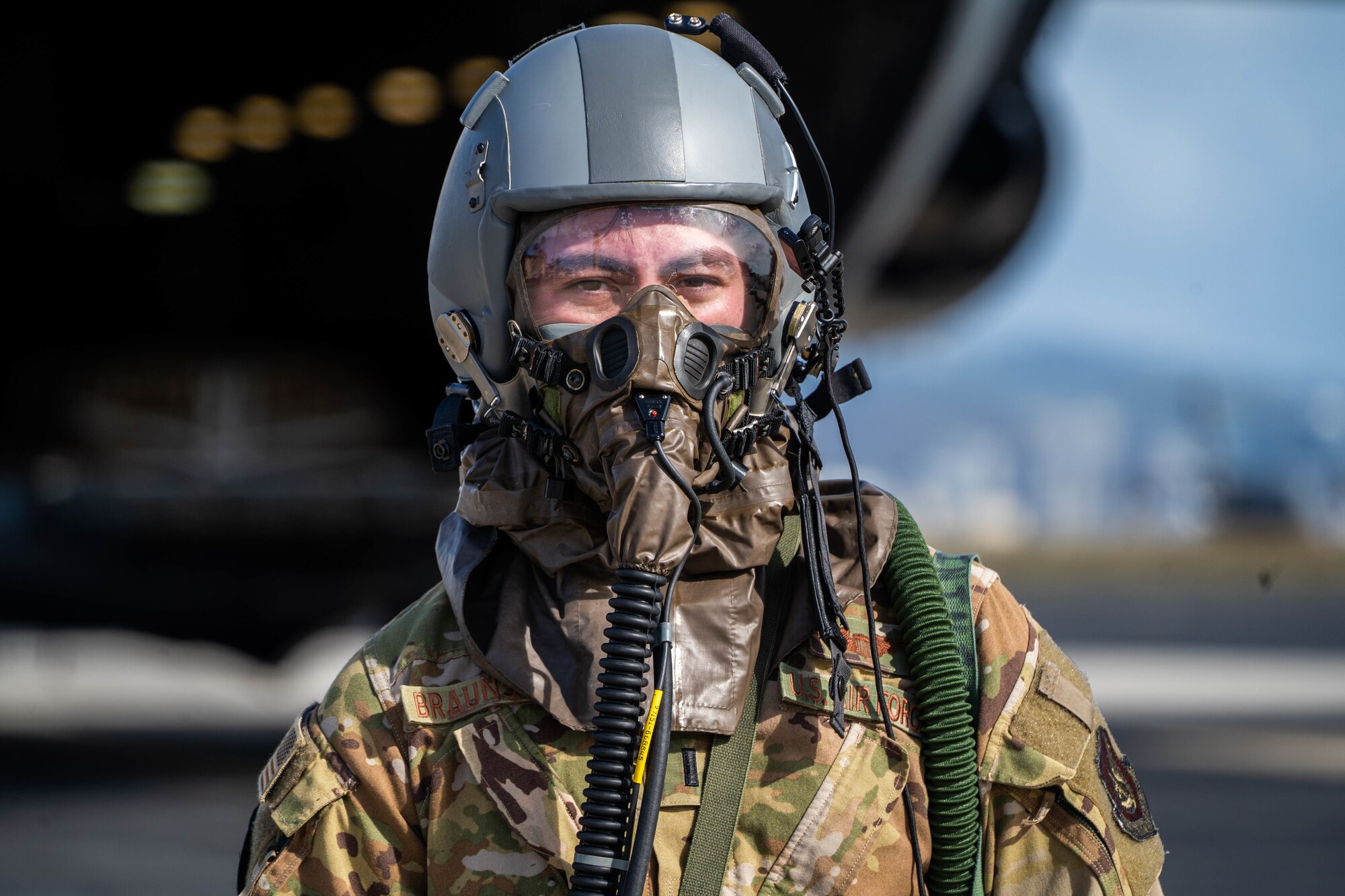 1st Lt. Erik Braunstein, 535th Airlift Squadron C-17 Globemaster III pilot, waits to be processed through the Aircrew Contamination Control Center during a decontamination exercise at Joint Base Pearl Harbor-Hickam, Hawaii, Nov. 9, 2022. First responders trained alongside Hickam airmen such as aircrew flight equipment technicians during the exercise to maintain mission readiness. (U.S. Air Force photo by Senior Airman Makensie Cooper)