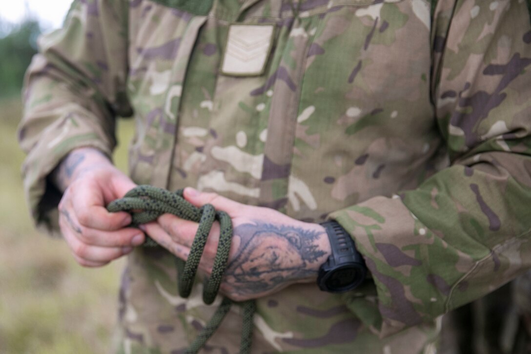 A Soldier from the New Zealand Army practices tying knots during single rope bridge instruction at Exercise Cartwheel, Nadi, Fiji, September 18, 2022. Exercise Cartwheel is a multilateral military-to-military training exercise with the United States, Republic of Fiji Military, Australian, New Zealand, and British forces that builds expeditionary readiness and interoperability by increasing the capacity to face a crisis and contingencies by developing and stressing units at the highest training levels.