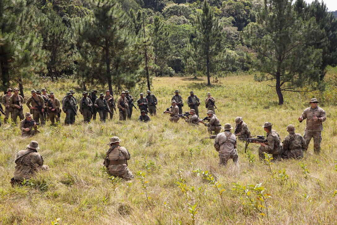 Sgt. Jacob Miller, a squad leader assigned to B Company, 2nd Battalion, 27th Infantry Regiment, 3rd Infantry Brigade Combat Team, 25th Infantry Division narrates a hasty ambush technique to New Zealand and Fijian soldiers during Exercise Cartwheel at Nausori Highlands Training Area, Fiji, September 17, 2022. Exercise Cartwheel is a multilateral military-to-military training exercise with the U.S., Republic of Fiji Military, Australian, New Zealand, and British forces that builds expeditionary readiness and interoperability by increasing the capacity to face a crisis and contingencies by developing and stressing units at the highest training levels.