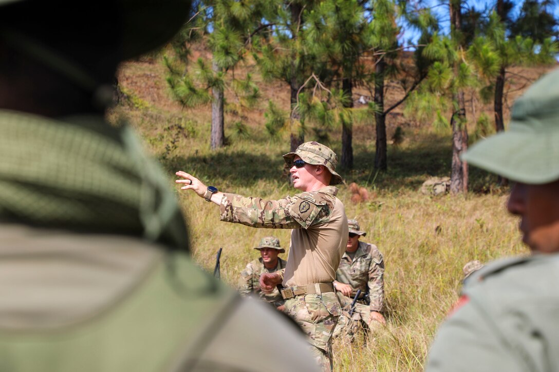 Spc. Connor MacDowell, a team leader assigned to B Company, 2nd Battalion, 27th Infantry Regiment, 3rd Infantry Brigade Combat Team, 25th Infantry Division instructs New Zealand and Fijian soldiers on American jungle tactics during Exercise Cartwheel at Nausori Highlands Training Area, Fiji, September 17, 2022. Exercise Cartwheel is a multilateral military-to-military training exercise with the U.S., Republic of Fiji Military, Australian, New Zealand, and British forces that builds expeditionary readiness and interoperability by increasing the capacity to face a crisis and contingencies by developing and stressing units at the highest training levels.