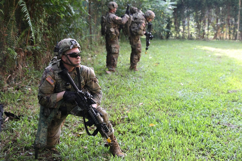SINGAPORE - U.S. Army Infantry Soldiers from the 1-2 Stryker Brigade Combat Team out of Joint Base Lewis McChord, Washington participate in a Field Training Exercise (FTX) during Exercise Tiger Balm 2022 here, June 15, 2022. The Annual Tiger Balm Exercise showcases and shares several different training events and activities, including the Field Training Exercise (FTX). (U.S. Army Reserve photo by Spc. Midori Preecs/Released)