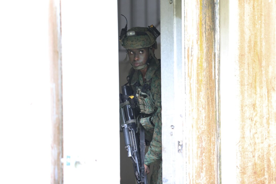 SINGAPORE - Singapore Armed Forces (SAF) soldiers participate in a Field Training Exercise (FTX) during Exercise Tiger Balm 2022 here, June 15, 2022. The FTX gives both the SAF and U.S. Army Soldiers a chance to learn and carry out new tactical training and share experiences and techniques with each other. (U.S. Army Reserve photo by Spc. Midori Preecs/Released)