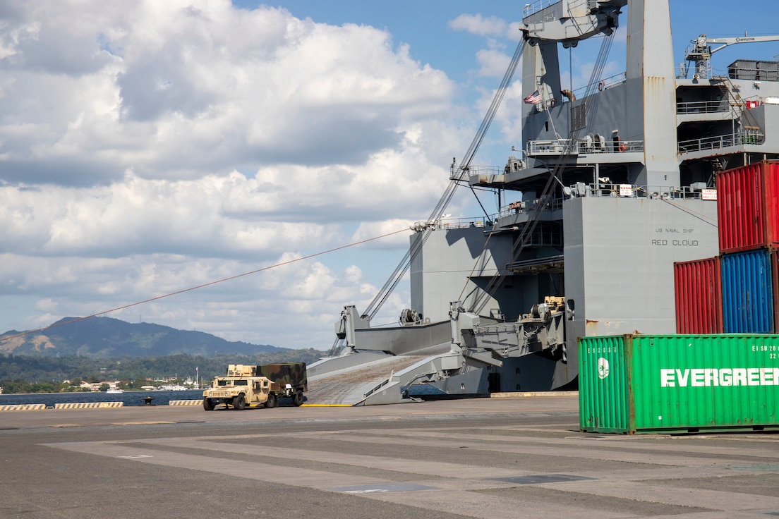 The last piece of equipment from Army Prepositioned Stock Afloas is driven off the U.S. Naval Ship Red Cloud. The downloaded equipment will be issued to Soldiers in participating in Salaknib 22. The employment of Army Prepositioned Stocks afloat builds the Army’s strategic readiness capabilities and demonstrates its ability to rapidly project power in the Indo-Pacific Theater during competition as well as during crisis and conflict.  (U.S. Army photo by Katie Nelson, 402nd Army Field Support Brigade)