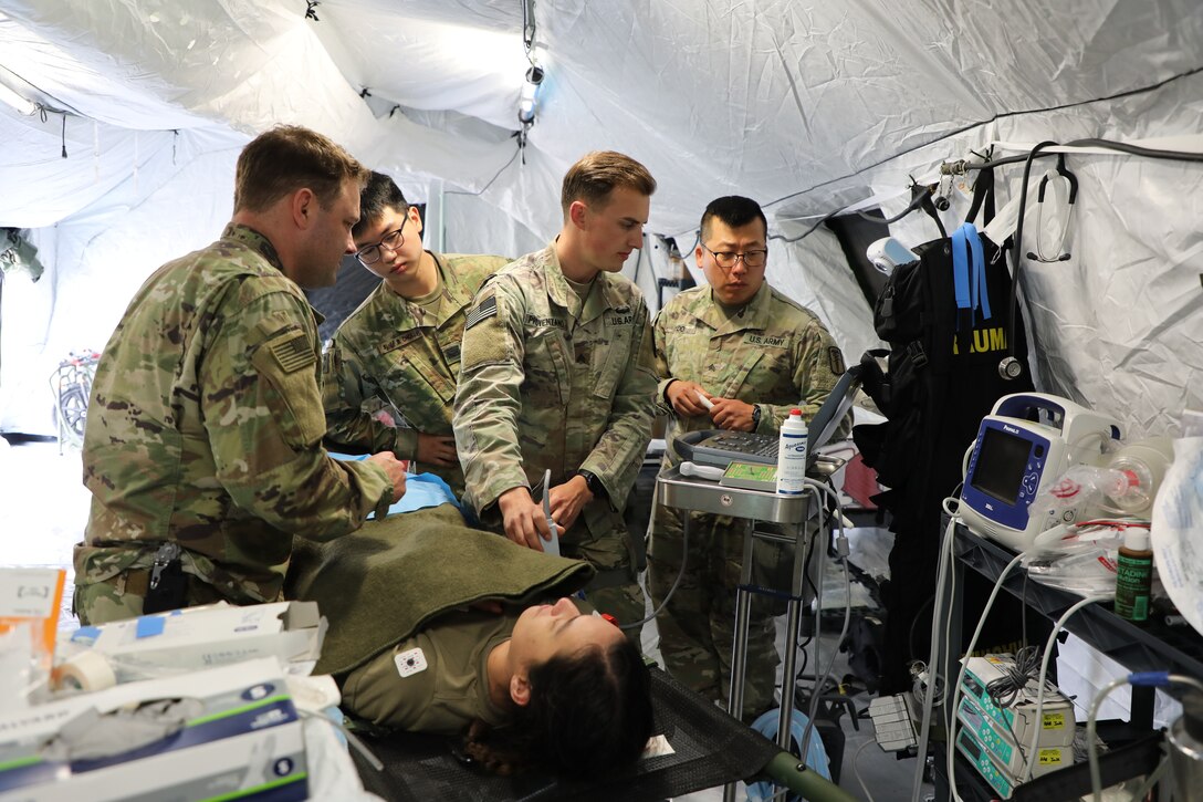 Sgt. Dominic Provenzano receives a hands-on training with a field equipment to improve his proficiency and knowledge providing battlefield medicine as a combat medic.