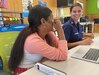 Coast Guard Academy Cadet Natalie Rodriguez, right, and a Beaver Works student work through a code project at the recent MIT Lincoln Laboratory's Beaver Works Summer Institute program.
