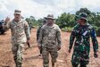 The Deputy Commander of the7th Infantry Division, Col. Leo discusses joint road repair operations with Sgt. 1st Class Jhomeng Macalino from 130th Engineer Brigade, 84th Engineer Battalion and the Indonesian National Military’s Coordinator of the Engineer Civil Assistance Project, Maj. Wahyu Nugrocho Python 1 Range, Baturaja, Indonesia, July 29, 2022, as part of Garuda Shield 2022. Garuda Shield, a part of Operation Pathways and a longstanding annual, bilateral military exercise conducted between the U.S. military, Indonesia National Armed Forces, reinforces the U.S. commitments to our allies, and other regional partners reinforcing joint readiness, and the interoperability to fight and win together. (U.S. Army photo by Sgt. Kyler Chatman, 8th Theater Sustainment Command)