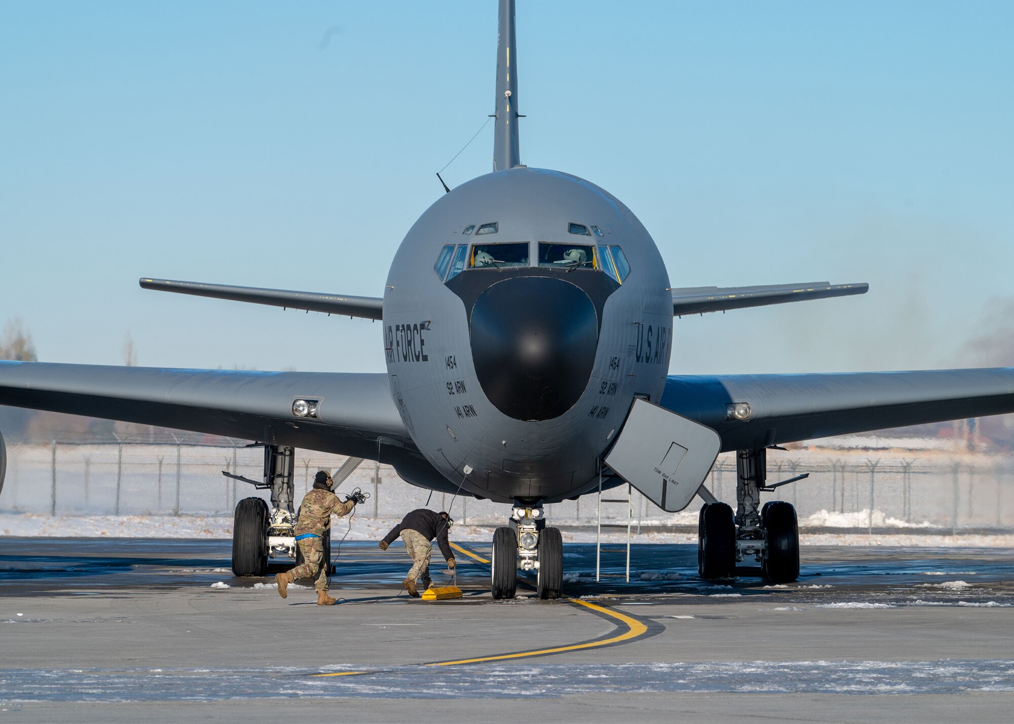 Crews from the 92nd Air Refueling Wing prepare a KC-135 Stratotanker for a simulated alert response during Titan Fury 23-1 at Fairchild Air Force Base, Washington, Nov. 9, 2022. during the Titan Fury 23-1 exercise. Readiness exercises at this scale enable U.S. strategic capabilities used every day to deter attacks.  (U.S. Air Force photo by Airman 1st Class Stassney Davis)