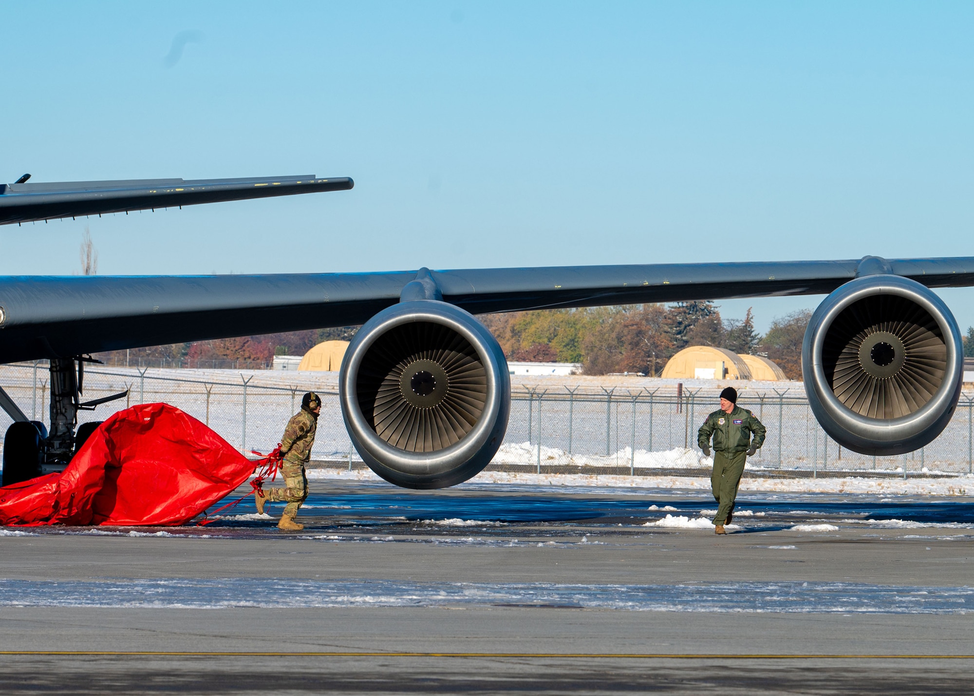 U.S. Air Force Airmen from the 92nd Aircraft Maintenance Squadron remove engine covers from a KC-135 Stratotanker during Titan Fury 23-1 at Fairchild Air Force Base, Washington, Nov. 9, 2022. The KC-135 Stratotanker aircraft has been utilized for decades to extend global reach and deterrence through aerial refueling, ensuring the projection of U.S. air power and deterrence of potential adversaries. They fuel strategic bombers, mobility and fighter aircraft, and airborne national command centers. (U.S. Air Force photo by Airman 1st Class Stassney Davis)