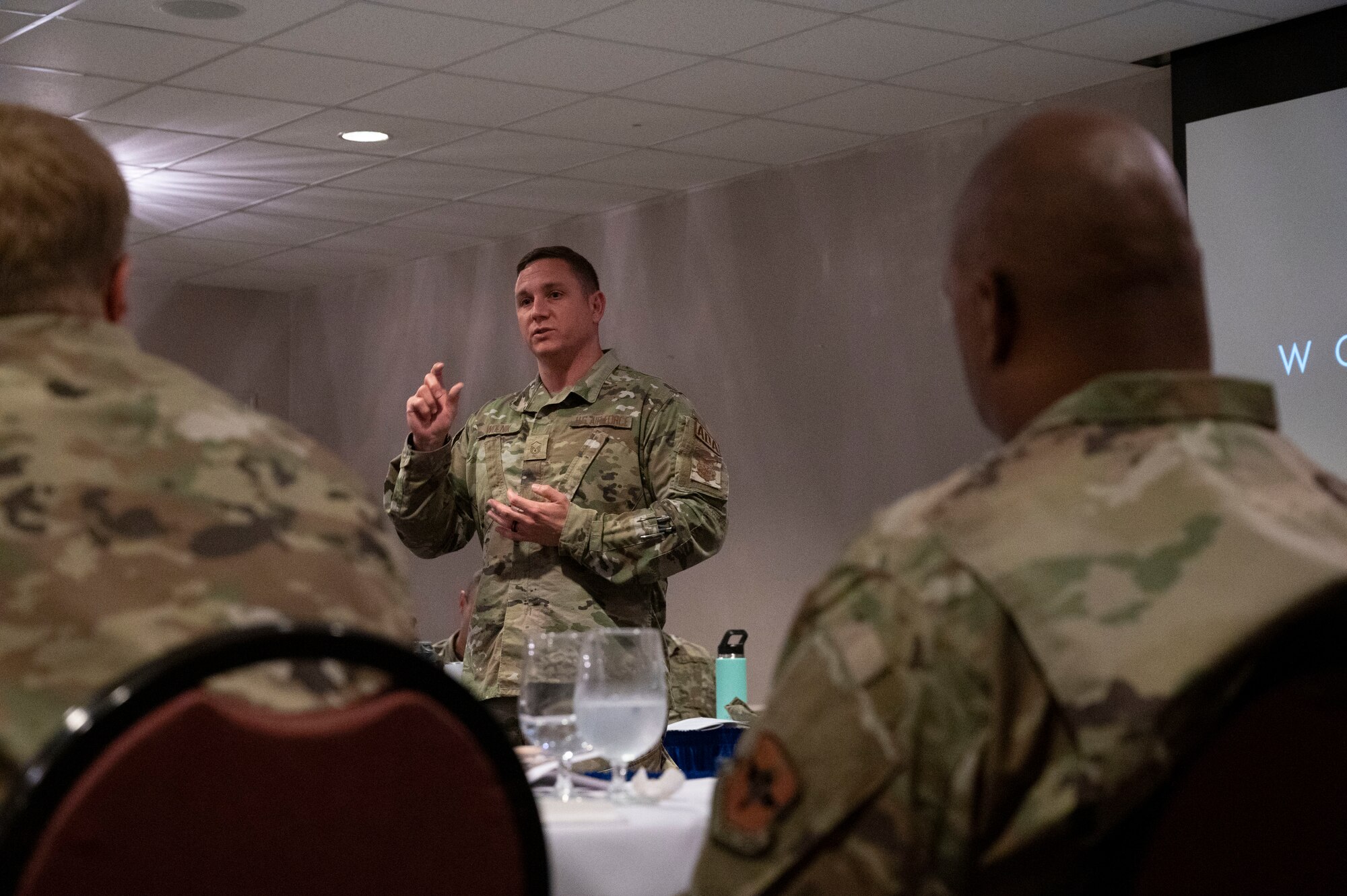 U.S. Air Force Master Sgt. James Wolnik, 47th Force Support Squadron Airmen development advisor, speaks with senior noncommissioned officers during a SNCO Summit event at Laughlin Air Force Base, Texas, Nov. 3, 2022.