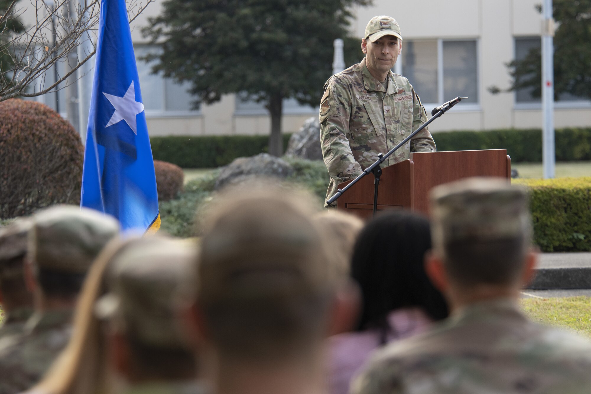 Col. Andrew Roddan, 374th Airlift Wing commander, delivers remarks during the 2022 Yokota Veterans Day Ceremony at Yokota Air Base, Japan, Nov. 10, 2022. Members of Yokota conducted a retreat ceremony as part of the event to respect and recognize the contributions veterans and their families, caregivers, and survivors have made toward the cause of freedom and peace across the globe. (U.S. Air Force photo by Tech. Sgt. Christopher Hubenthal)