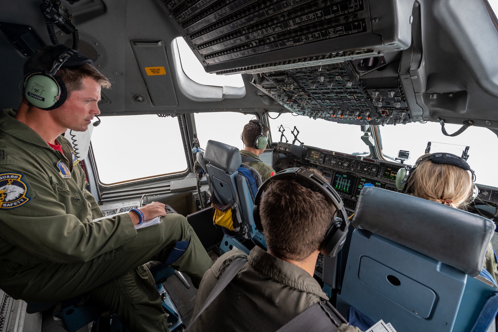 U.S. Air Force Lt. Col. Jared Shank, 167th Airlift Wing Operations Group, evaluates the crew of a C-17 Globemaster III aircraft during a flight over Martinsburg, West Virginia, Nov. 5, 2022. Shank evaluated the performance of the crew for points during the 167th OPG rodeo, a competitive skill evaluation.