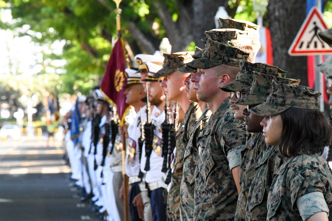 U.S. Marines stand in formation among other participants during a “Victory in Europe Day” World War II remembrance ceremony outside the Haut-commissariat de la République Tahiti, French Polynesia, May 8, 2022. Our continued, face-to-face interactions with our allies and partners are the foundation of our bilateral relationships, which create confidence in the region that we are going to be there when times are good but also when times are bad. (U.S. Air Force photo by Staff Sgt. Jessica Avallone)