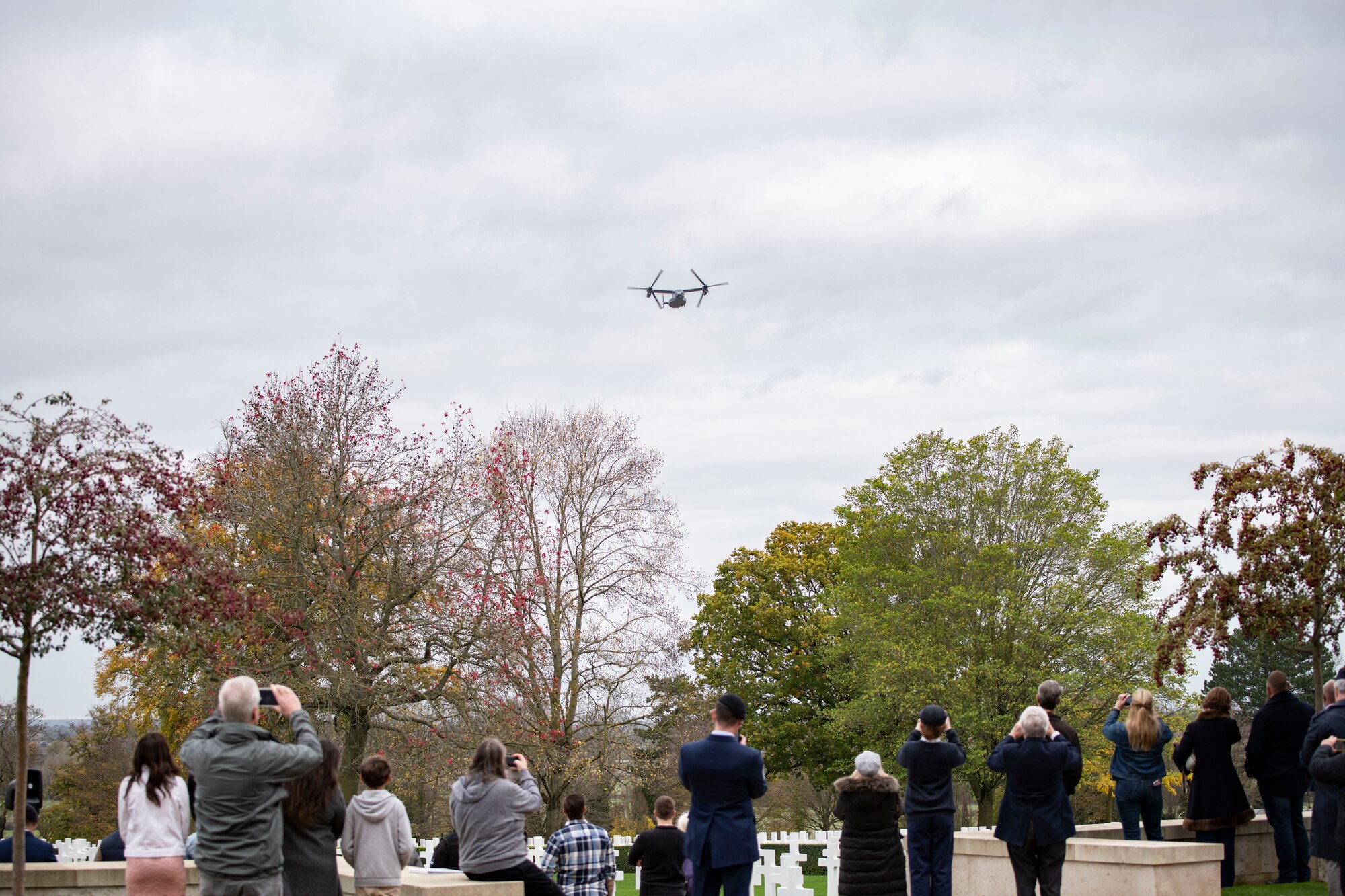 A CV-22B Osprey from the 7th Special Operations Squadron participates in a flyover at Cambridge American Cemetery and Memorial in Cambridge