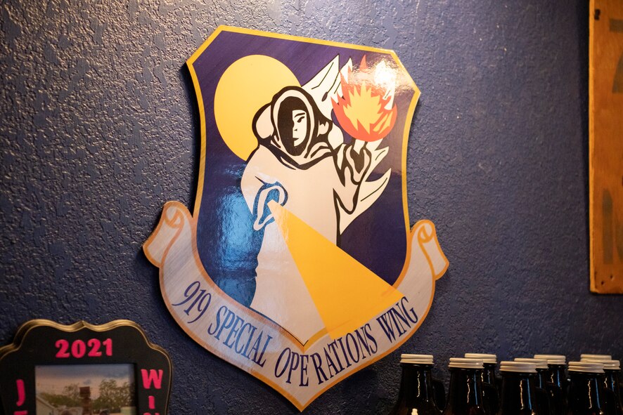 Wall decorations featuring 919th SOW wing shield