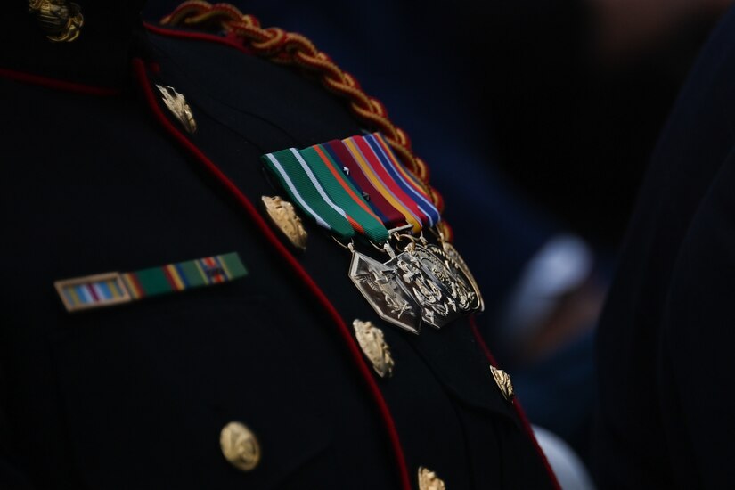 Medals rest on a Marine Corps uniform at the opening of Spirit Park in National Harbor, Md., Nov. 11, 2022. Veterans, servicemembers and first responders joined in the ceremony to help raise the flags for the first time. (U.S. Air Force photo by Staff Sgt. Spencer Slocum)