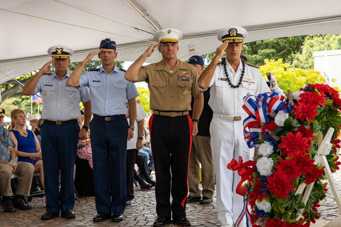 U.S. Coast Guard Rear Adm. Michael H. Day, commander, 14th Coast Guard District, U.S. Air Force Gen. Kenneth S. Wilsbach, commander, Pacific Air Forces, U.S. Marine Corps Brig Gen. Joseph R. Clearfield, deputy commander, U.S. Marine Corps Forces, Pacific, and U.S. Navy Adm. John Aquilino, commander, U.S. Indo-Pacific Command, render a salute to a ceremonial wreath during a Veterans Day Ceremony at the National Memorial Cemetery of the Pacific in Honolulu, Hawaii, November 11, 2022. Veterans Day began as Armistice Day, honoring the end of World War I. Veterans Day pays tribute to all American veterans, living or dead, who served their country honorably during war or peacetime. This ceremony was presented by the Oahu Veterans Council. (U.S. Marine Corps photo by Cpl. Haley Fourmet Gustavsen)
