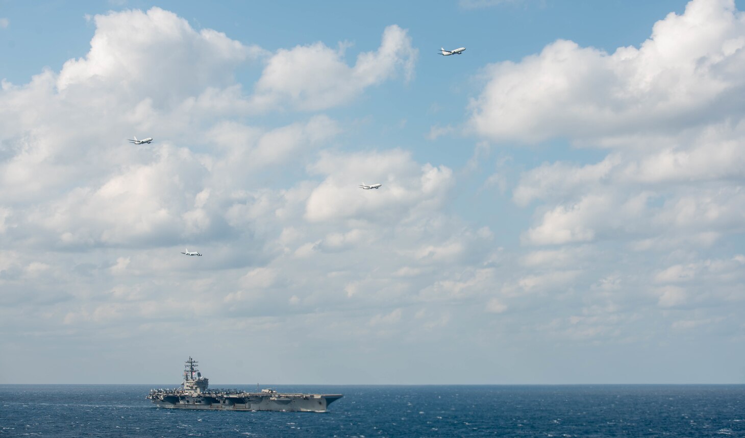 221111-N-LI114-1320 PHILIPPINE SEA (Nov. 11, 2022) Aircraft from the U.S. Navy, Japan Maritime Self-Defense Force (JMSDF), and Royal Australian Navy (RAN) fly over the U.S. Navy’s only forward-deployed aircraft carrier, USS Ronald Reagan (CVN 76), during Exercise Malabar 2022, in the Philippine Sea, Nov. 11. Malabar 2022 is a Japan-led, surface, air, and subsurface multi-lateral field training exercise with the Indian Navy, JMSDF, Royal Australian Navy and U.S. Navy. Malabar 2022 enhances interoperability between Australian, Indian, Japanese and U.S. maritime forces, strengthens the critical partnerships and demonstrates U.S. naval presence in the Indo-Pacific region. (U.S. Navy photo by Mass Communication Specialist 2nd Class Michael B. Jarmiolowski)