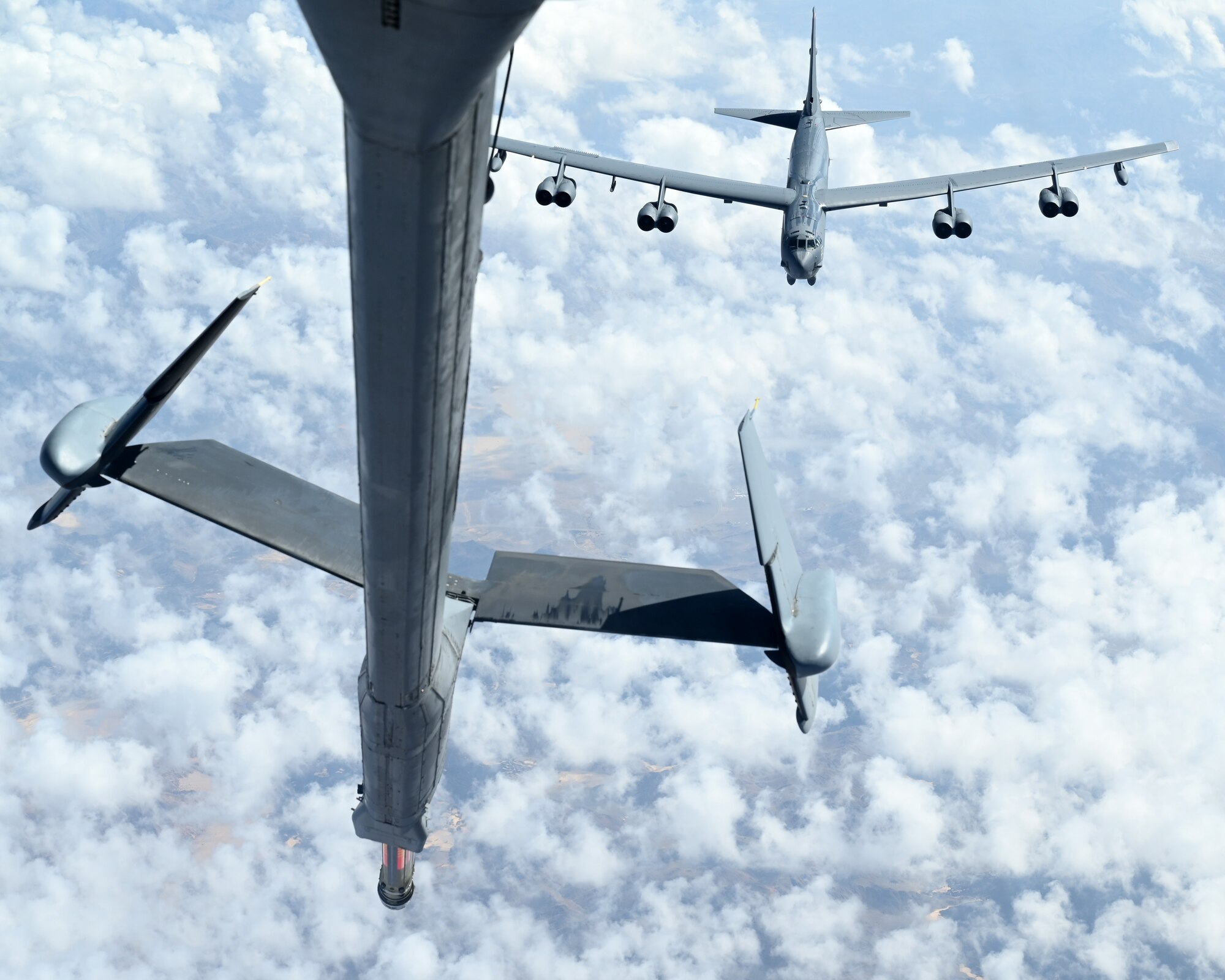 A U.S. Air Force B-52H Stratofortress from Barksdale Air Force Base, La., prepares to be refueled by a U.S. Air Force KC-10 Extender assigned to the 908th Expeditionary Air Refueling Squadron, during a Bomber Task Force mission over the U.S. Central Command area of responsibility, Nov. 10, 2022. The bomber deployment showcases the U.S. military’s commitment to regional security and demonstrates the capabilities of a short-notice, rapid deployment of assets. The B-52 is a long-range, heavy bomber, capable of flying high subsonic speeds at altitudes up to 50,000 feet providing the U.S., coalition and partner forces with a global strike capability to deter conflict while credibly demonstrating the U.S.’s ability to address a global security environment. (U.S. Air Force photo by Staff Sgt. Gerald R. Willis)