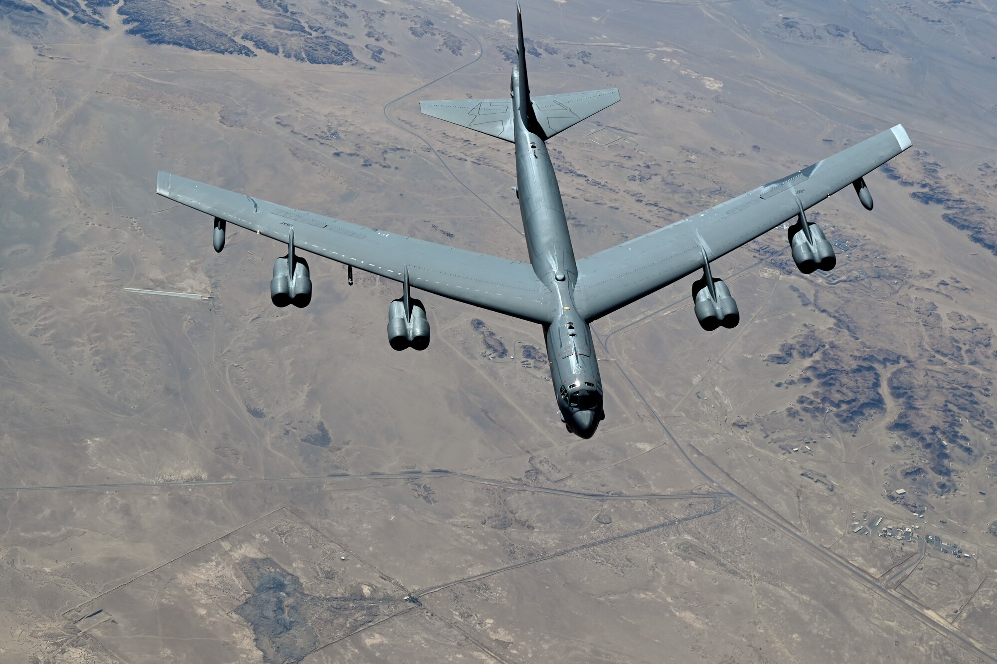 A U.S. Air Force B-52H Stratofortress from Barksdale Air Force Base, La., flies in formation, during a Bomber Task Force mission over the U.S. Central Command area of responsibility, Nov. 10, 2022. The bomber deployment showcases the U.S. military’s commitment to regional security and demonstrates the capabilities of a short-notice, rapid deployment of assets. The B-52 is a long-range, heavy bomber, capable of flying high subsonic speeds at altitudes up to 50,000 feet providing the U.S., coalition and partner forces with a global strike capability to deter conflict while credibly demonstrating the U.S.’s ability to address a global security environment. (U.S. Air Force photo by Staff Sgt. Gerald R. Willis)