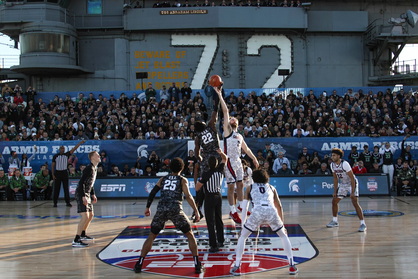 Gonzaga University and Michigan State University compete in the 2022 ESPN Armed Forces Classic – Carrier Edition, aboard USS Abraham Lincoln (CVN 72) at Naval Air Station North Island.