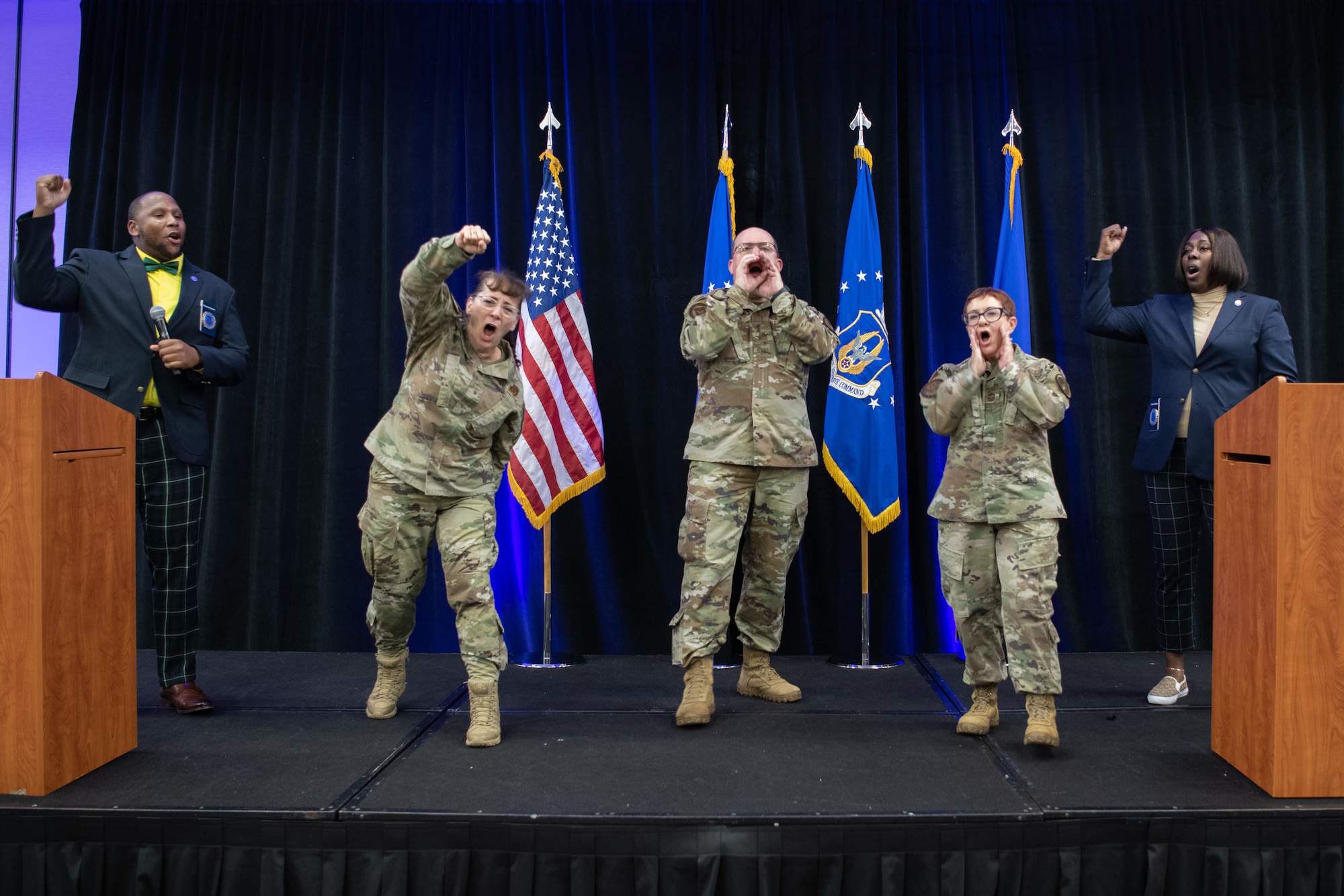Air Force Recruiting Service leaders shout from the stage