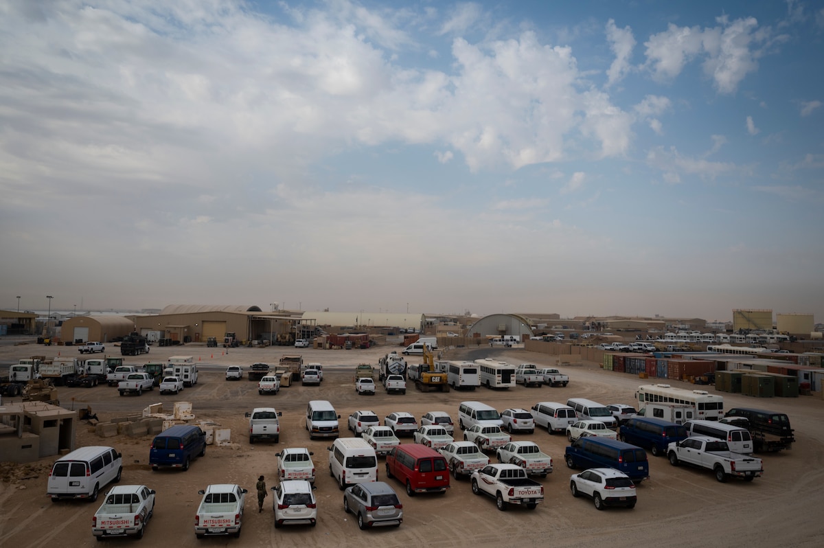 U.S. Air Force Airman 1st Class Kendreaunna Farrow, 386th Expeditionary Logistics Readiness Squadron fleet management, conducts a daily check on the vehicle yard to let the mechanics know status updates on current work orders prior to them operating at Ali Al Salem Air Base, Kuwait, Nov. 10, 2022. The 386th ELRS vehicle management team has gone from 216 work orders to less than 60 work orders in a few months by empowering its Airmen to the maximum. (U.S. Air Force photo by Staff Sgt. Dalton Williams)