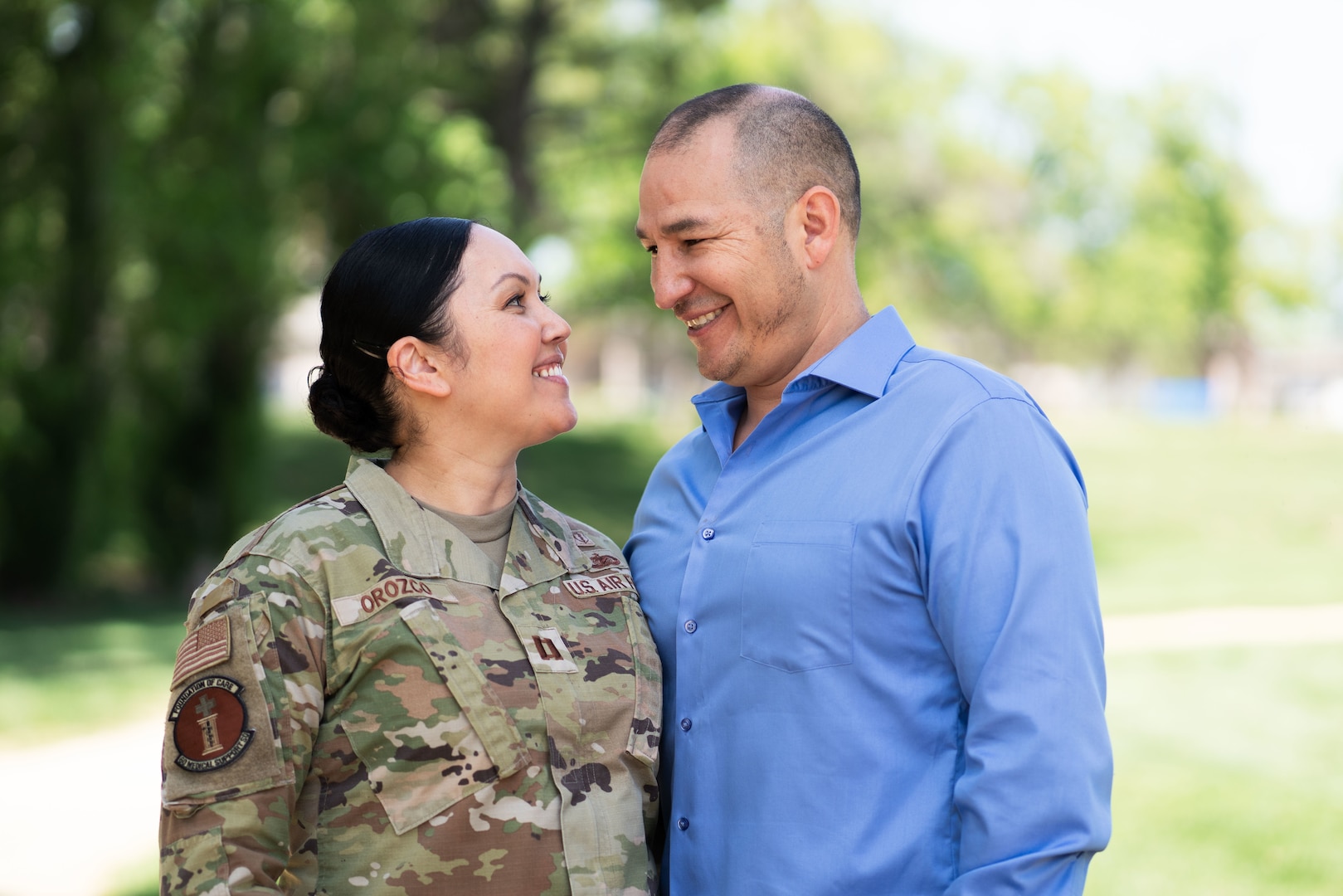 Service member poses with her spouse