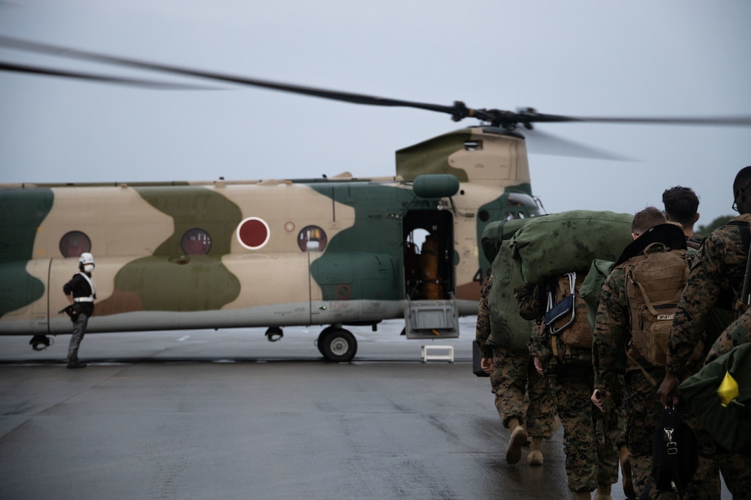 U.S. Marines with 12th Marines, 3d Marine Division, take off in a Japan Self-Defense Force CH-47JA helicopter in support of Keen Sword 23, on Okinawa, Japan, Nov 11, 2022.