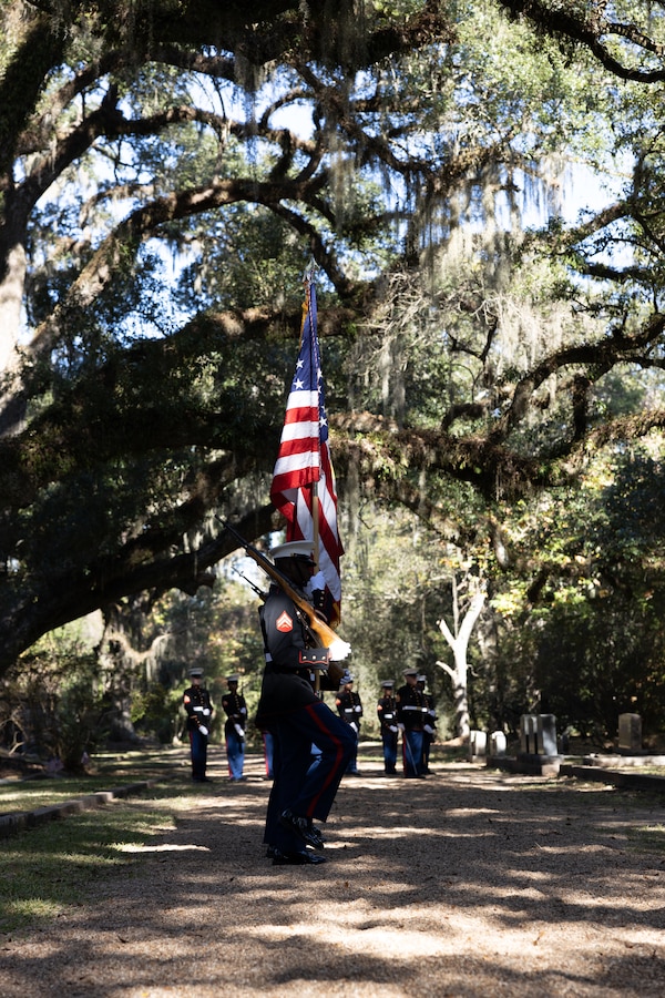 The color guard of Truck Company, 23rd Marine Regiment, 4th Marine Division, march on the national colors during a wreath laying ceremony at Grace Church of West Feliciana, St. Francisville, La. on Nov. 10, 2022. The ceremony is an annual event that takes place on the Marine Corps birthday at Gen. Robert H. Barrow's gravesite, who served as the 27th Commandant of the Marine Corps. (U.S. Marine Corps photo by Staff Sgt. Jestin Costa)